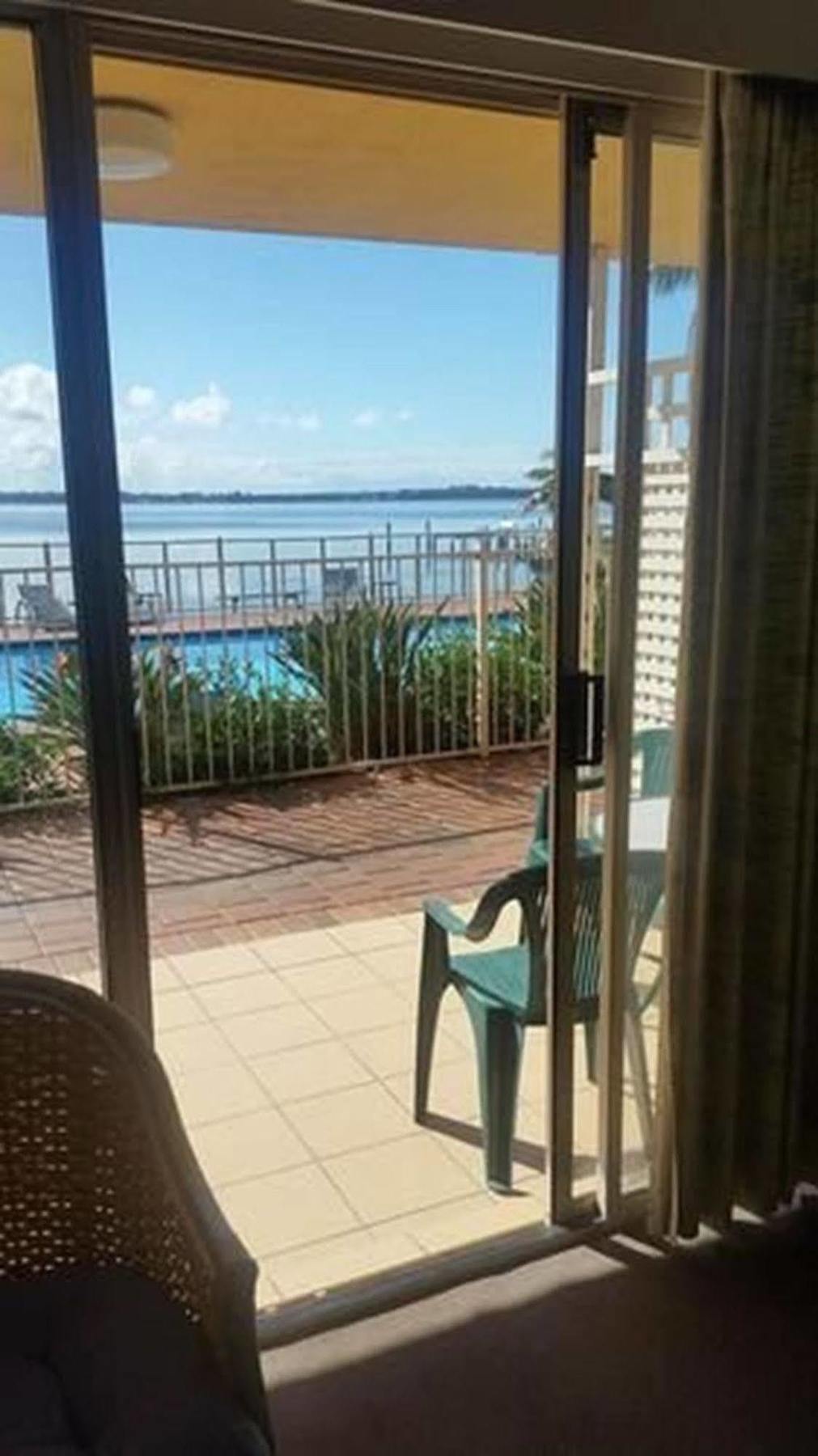 The Beachcomber Hotel & Resort, Ascend Hotel Collection Toukley Extérieur photo View of the pool from a guest room